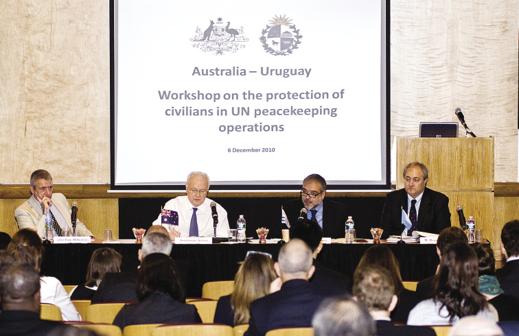 The Australian Permanent Representative to the United Nations, Gary Quinlan (second left), and the Uruguayan Permanent Representative to the United Nations, José Luis Cancela (second right), hosting a workshop on the protection of civilians in UN peacekeeping operations, with panellists, Chief Plans Officer, MONUSCO, Lieutenant Colonel Nicholas Peek, (United Kingdom) (left); and Officer in Charge, Humanitarian Liaison Office, UNAMID, Oriano Micaletti (Italy) (right), New York, 6 December 2010. [Department