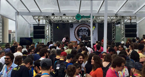 crowd standing infont of stage watching Deathrays performing