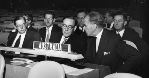 The Australian Minister for External Affairs, RG Casey (front right), discusses a point with the Australian delegation to the UN General Assembly, New York, October 1952. Back (left to right): David McNicoll (obscured); Allan Loomes; Roy McCarthy; and Max Loveday. Front (left to right): KCO (Mick) Shann and the Australian Ambassador to the United States, Sir Percy Spender. [UN Photo/Leo Rosenthal]