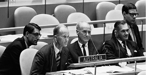 The Australian Permanent Representative to the United Nations, David Hay (second left), Deputy Permanent Representative Dudley McCarthy (third left), and Second Secretary Terry White (second right) with First Secretary Michael Cook (back left), attend carefully in the General Assembly debate, New York, 14 October 1963. [UN Photo/TC]