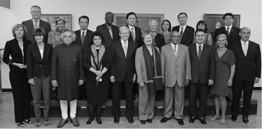 The Australian Minister for Foreign Affairs, Kevin Rudd (fifth left), joins other members of the Secretary-General's High-Level Panel on Global Sustainability, co-chaired by President of Finland Tarja Halonen (front, sixth left) and President of the Republic of South Africa Jacob Zuma (front, fourth right), New York, 18 September 2011. Other members: front (left to right): Connie Hedegaard, EU Commissioner for Climate Action; Micheline Calmy-Rey, 2011 President of the Swiss Confederation and Minister for Fo