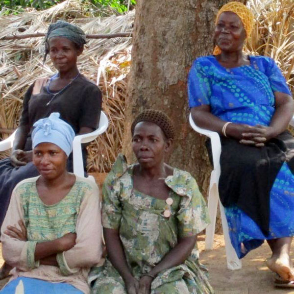 Four women sitting outside