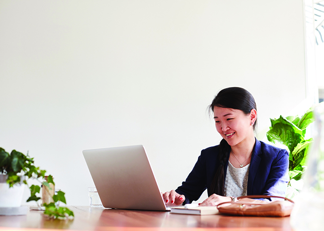 women at a laptop