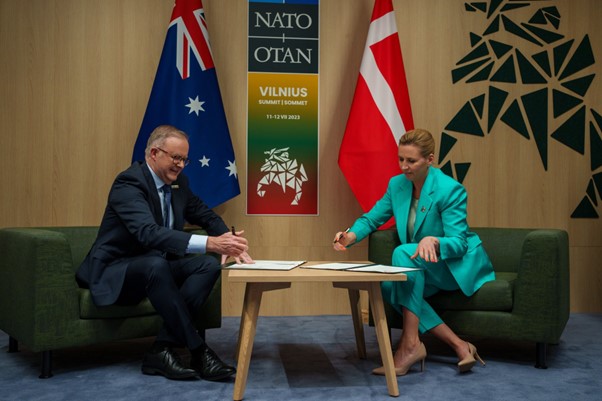 The Prime Minister of Australia and the Prime Minister of Denmark signing the Australia-Denmark Strategic Partnership Arrangement.