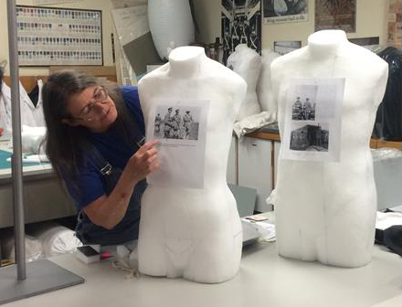 Australian War Memorial sculptor Clare Martin preparing mannequins that will 'wear' General Sir Harry Chauvel's tunic and Sam Browne belt, and Pompey Elliott's dress uniform, for display in 2015. Credit: Gina Dow.