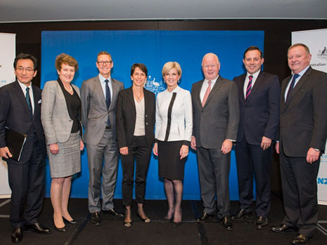 Minister Bishop poses for a group photo