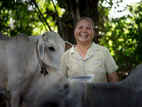 Photo of Ree with her cattle.