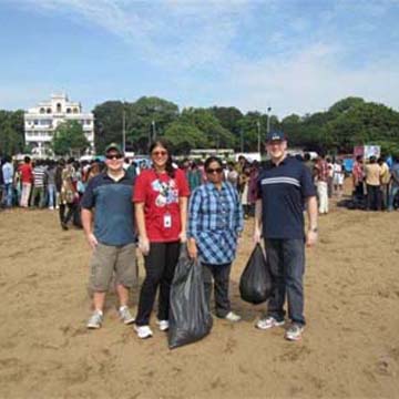 Volunteers collecting rubbish from Chennais' Marina Beach on International Coastal Cleanup Day