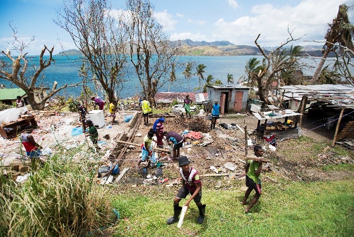 Workers cleaning a building site