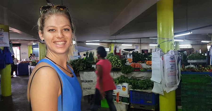 Maxi Jerram-Snell in a fruit and vegetable market in Suva, Fiji.