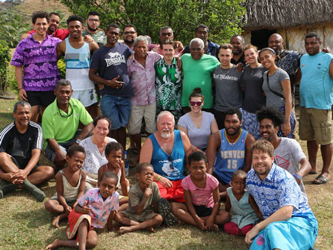 Group of 32 people posing for a photo.