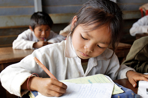 student in a Lao classroom