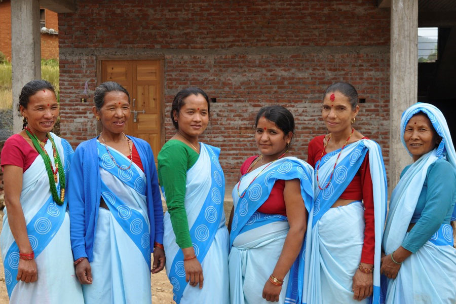 Six women pose for a photo