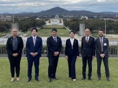 Six CFP delegates from Japan accompanied by DFAT officers on Parliament House Lawns, Canberra.