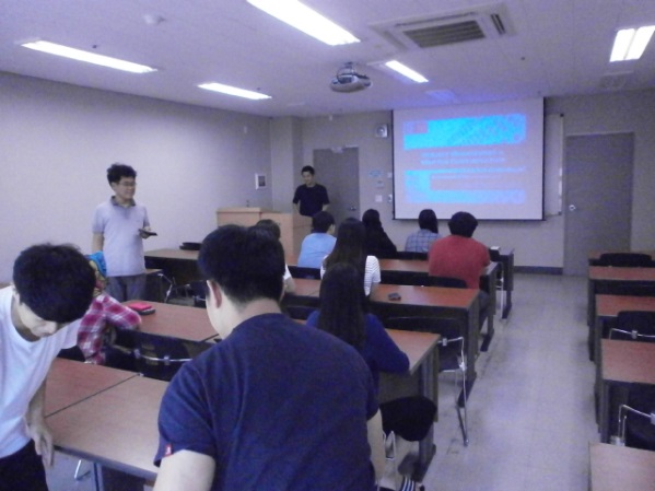 students sat at desks in classroom