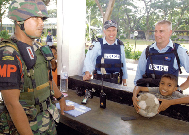 Photo of Australian Federal Police and Royal Malaysian Army