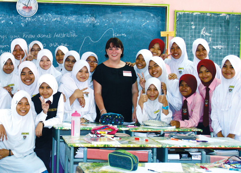 Photo of Australian teacher and PhD candidate Rebecca Cairns with students