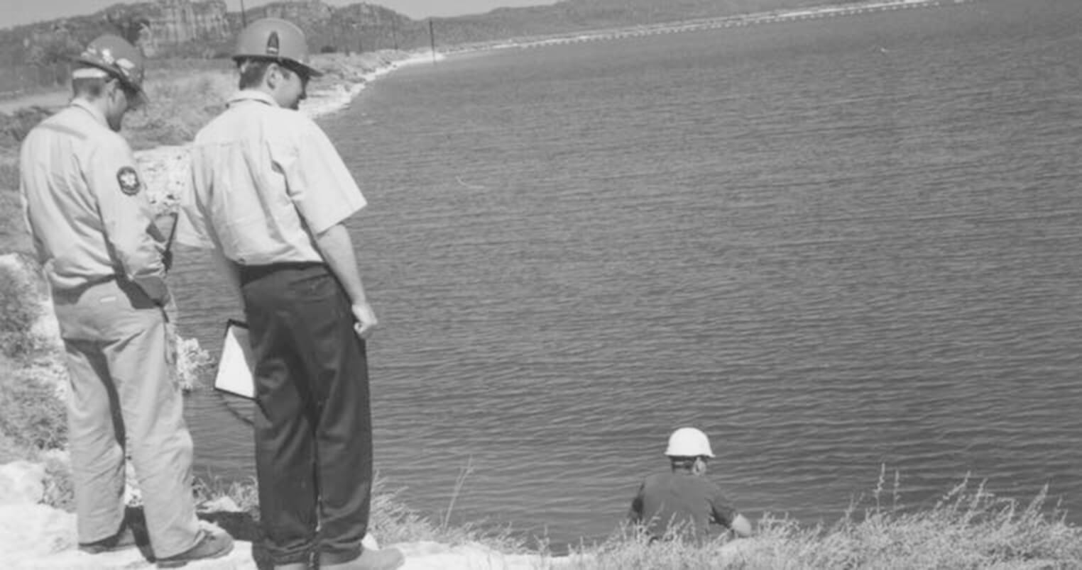 IAEA inspector taking notes from the Ranger Mine control board and collecting samples from the tailings dam during a complementary access inspection under the Additional Protocol on 28 June 1999. (Photos courtesy of ERA).