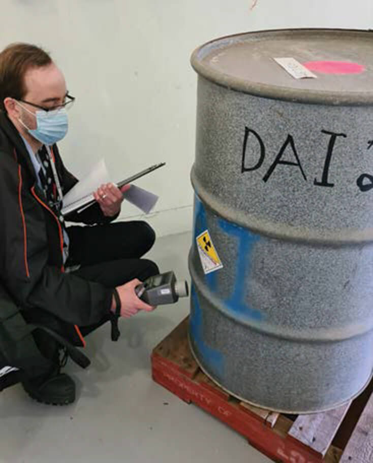 ASNO inspector performing a measurement with an HM–5 handheld spectrometer during IAEA Complementary Access at CSIRO, 28 August 2020.