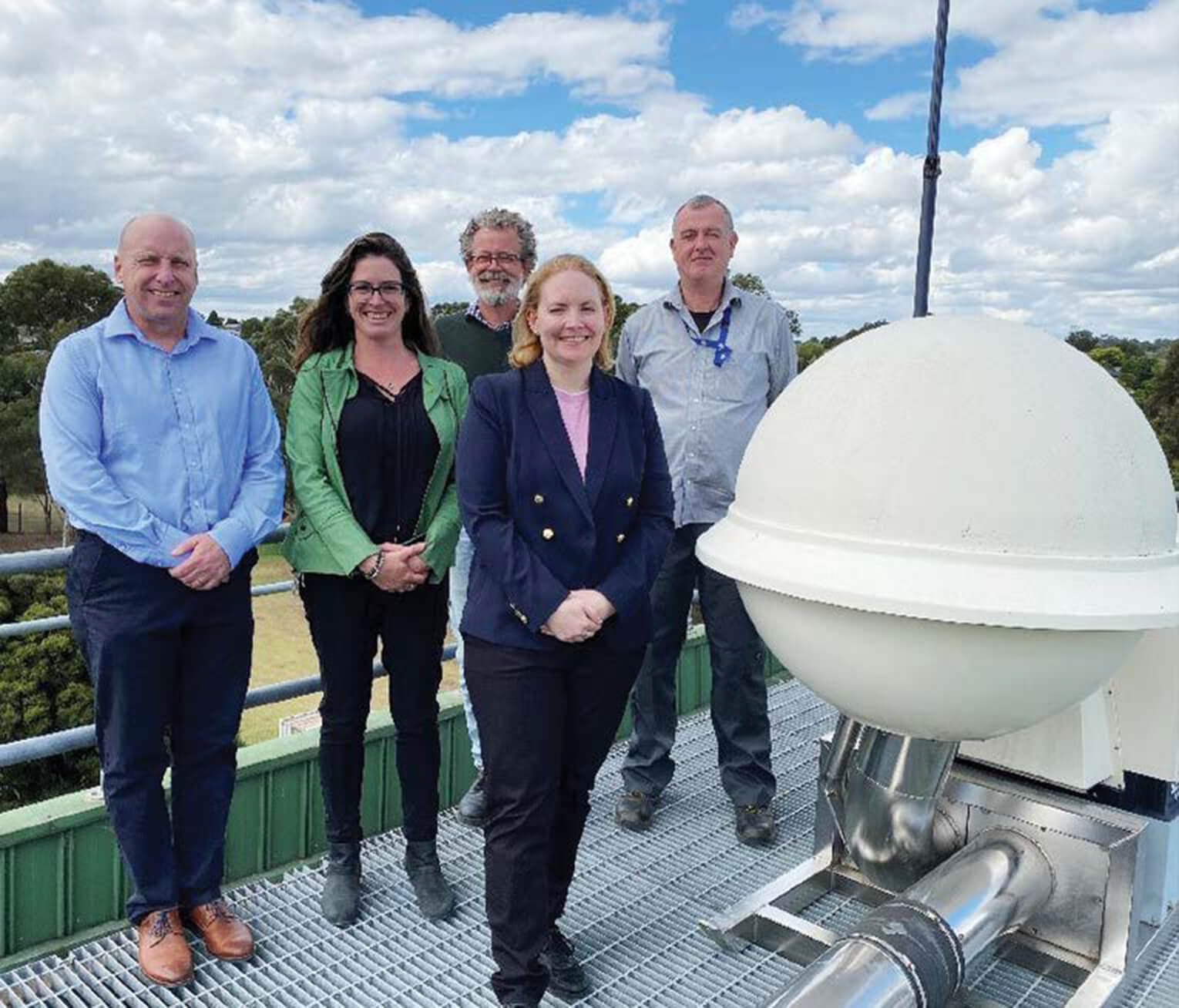 Australia's RN04 radionuclide monitoring station in Melbourne, part of the CTBTO International Monitoring System, with the dedicated ARPANSA team, during a visit from ASNO.