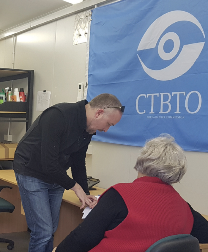 Michael Lane discusses with the local operator proposed maintenance work at the Cape Leeuwin Hydro-acoustic station (HA01). (Image courtesy of ASNO)