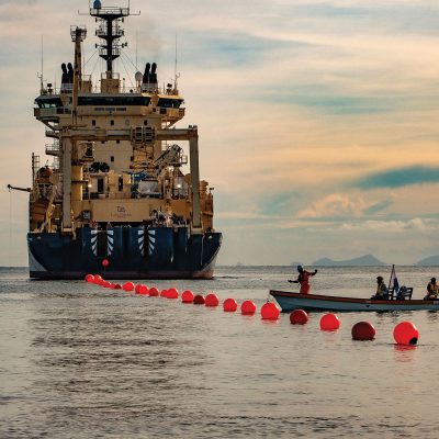 Cable-laying vessel Ile de Brehat commencing the Coral Sea cable lay in Honiara [DFAT/Qoriniasi Jr. Bale]