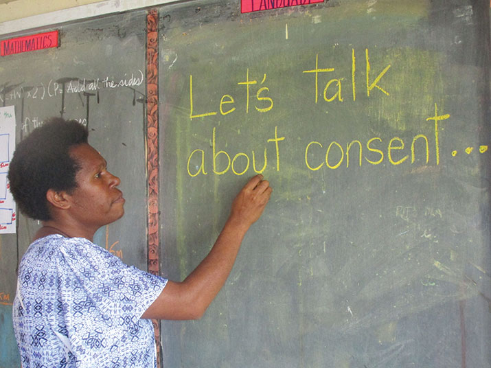 Teacher at Mainohana Secondary School, Papua New Guinea, delivering a lesson from the department’s Rights, Respect and Resilience project [ChildFund]