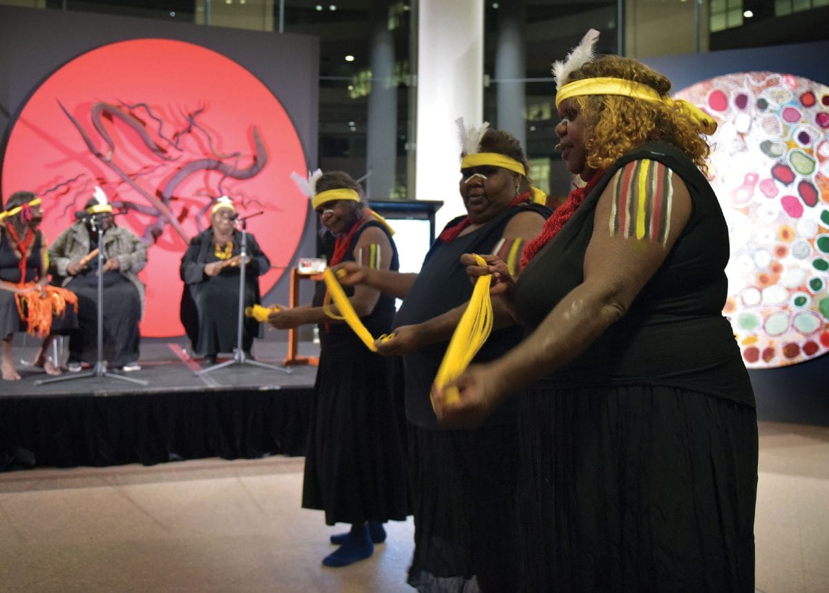 Indigenous women from the Central and Western Deserts performing the story of the Seven Sisters at NAIDOC celebrations at the department in Canberra: dancers Francie Ingkatji, Pantitji Lewis and Alison Carol; singers Inawinytji Williamson, Rene Kulitja and Yaritji Heffernan [Mark Graham Media]