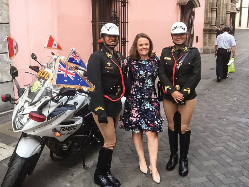 Ambassador to Peru Diana Nelson with female motorized police in Lima, Peru [DFAT]