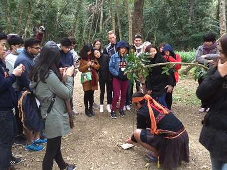 NCP students watch on as a hunting trap is set