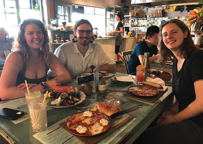 NCP alumni Charley, Oliver and Mika catch up over breakfast in Townsville.