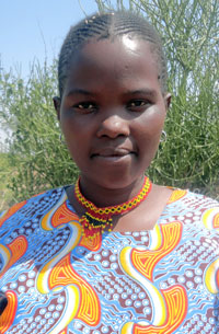 Photo of Susan Apua, an African farmer participating in AACES