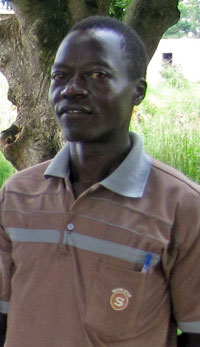 Photo of Benon Okeng, AACES community volunteer.