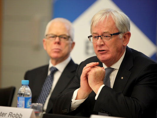 Andrew Robb speaking at a panel