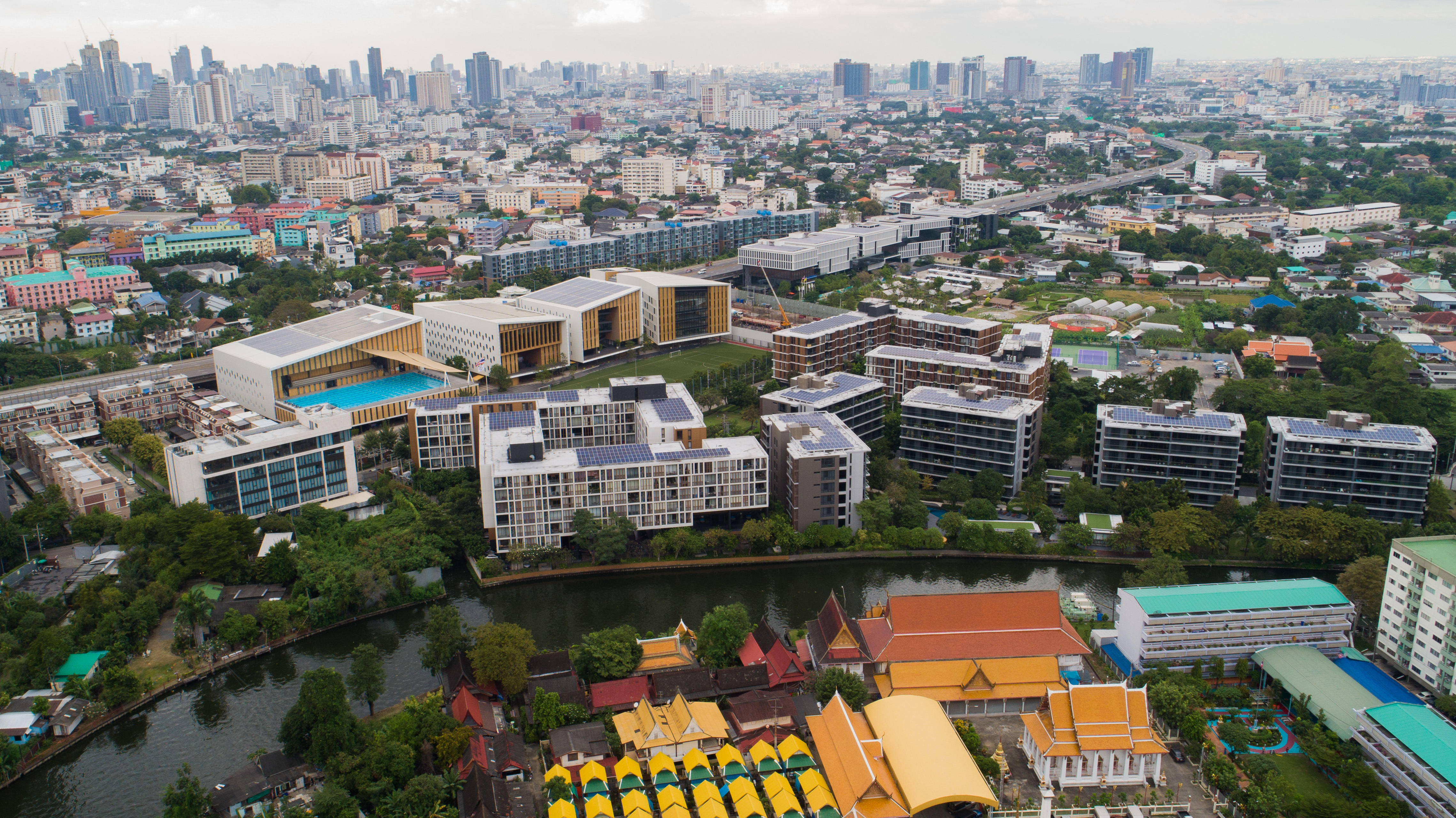 Buildings with solar panels on the roofs.