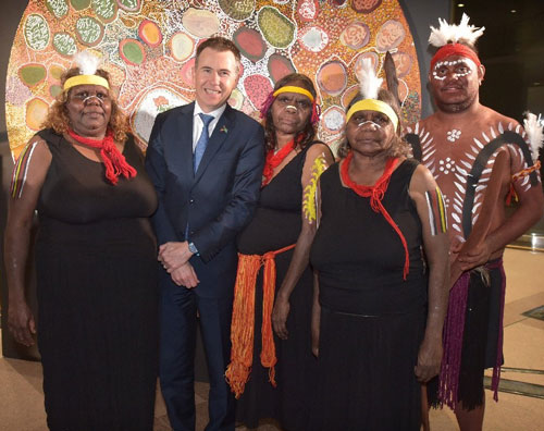 Seven Sister Performers with A/g Secretary and Indigenous Champion Richard Maude posing for photo.