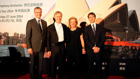 Sydney Symphony Orchestra Managing Director Rory Jeffes, Chief Conductor David Robertson, Ros Packer and Justin Hayhurst, Deputy Head of Mission at the Australian Embassy, Beijing, pictured in front of publicity signage for the SSO China tour. Photo:Julian Kingma