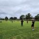 Group of people of a soccer field practising skills