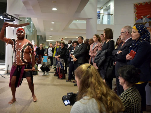 Tapaya Edwards performs the Wati Nguru role in a dance for the DFAT crowd.