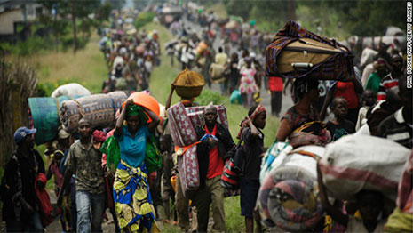 People flee violence from fighting between militias and the army in eastern DRC. Some 430,000 refugees from the DRC remain in neighbouring countries. (Credit: AFP/Getty)