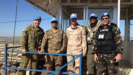 Australian Defence Force Officer with fellow UNTSO and UNDOF peacekeepers at an observation point in the Golan Heights. (Credit: Commonwealth of Australia)